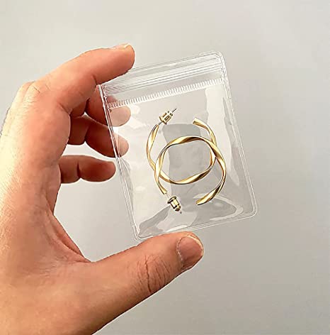 Photo 1 of 100 Pack PVC Clear Jewelry Anti Oxidation Zipper Bag Antitarnish Plastic Bags for Packaging Jewelry Rings Earrings Transparent Poly Pouch (Clear, 1.96×2.75 inch)
