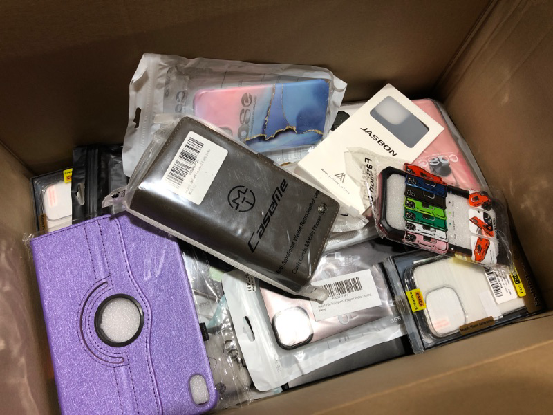 Photo 1 of LARGE box lot of phone cases, tablet cases, smart watch protectors, screen protectors, airpod cases, etc. Various styles for various different electronic devices. All new, sold as is. This lot is amazing!