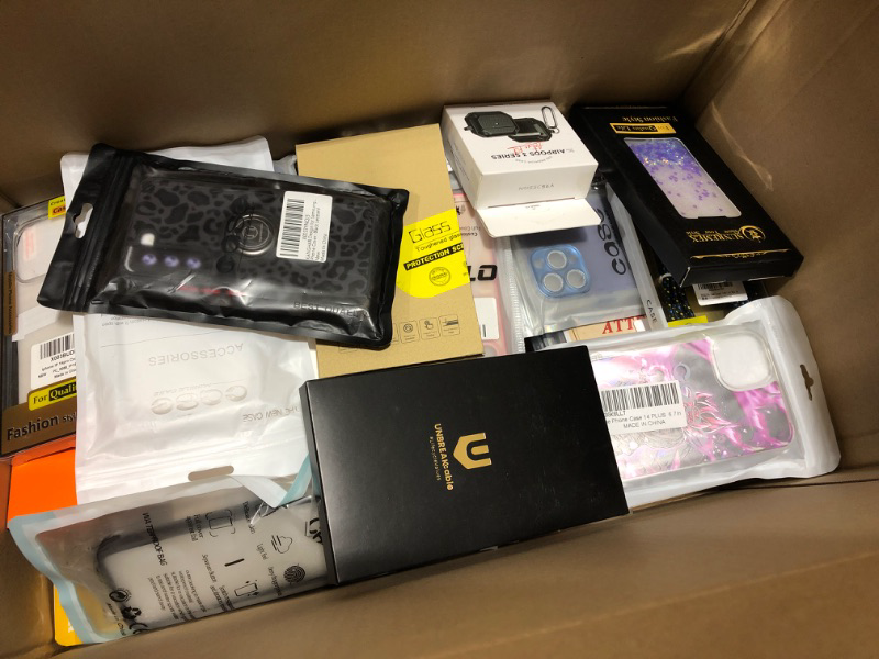 Photo 3 of LARGE box lot of phone cases, tablet cases, smart watch protectors, screen protectors, airpod cases, etc. Various styles for various different electronic devices. All new, sold as is. This lot is amazing!