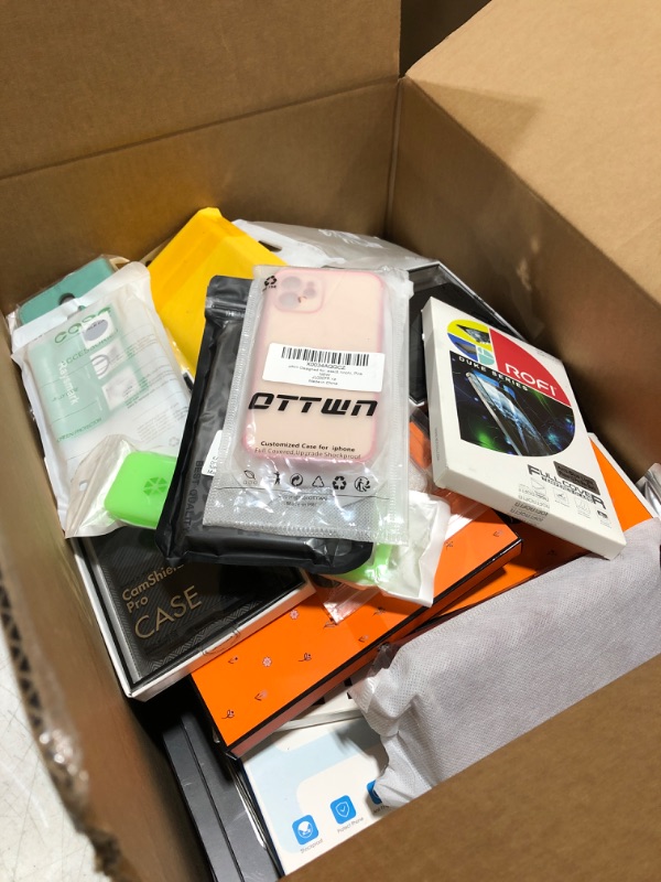 Photo 3 of LARGE box lot of phone cases, tablet cases, smart watch protectors, screen protectors, airpod cases, etc. Various styles for various different electronic devices. All new, sold as is. This lot is amazing!