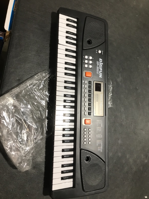 Photo 1 of aPerfectLife Keyboard Piano for Kids, 61 Keys Multifunction Electric Piano Keyboard Early Learning Educational Music Instrument Toys for Boys and Girls 630A1