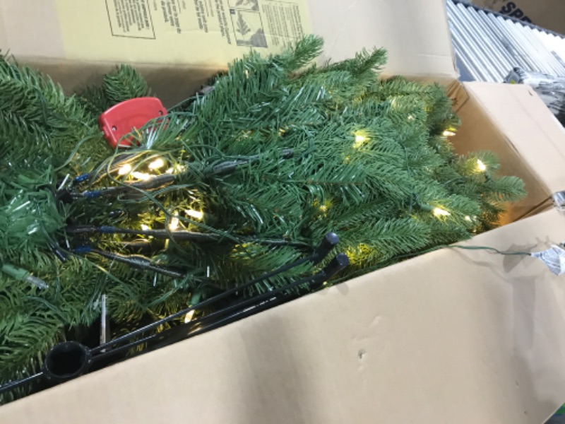 Photo 2 of National Tree Company Pre-Lit 'Feel Real' Artificial Slim Downswept Christmas Tree, Green, Douglas Fir, Dual Color LED Lights, Includes PowerConnect and Stand, 7.5 feet 7.5 ft Tree