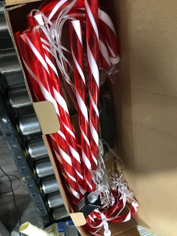 Photo 3 of 28” Candy Cane Lights Outdoor Pathway, 42 Feet in Total Length with 12 Pack Candy Cane Pathway Lights with Shiny Star for Outside Christmas Decorations, 10 LED Lights in Each Light Up Candy Canes 12 Pcs Star