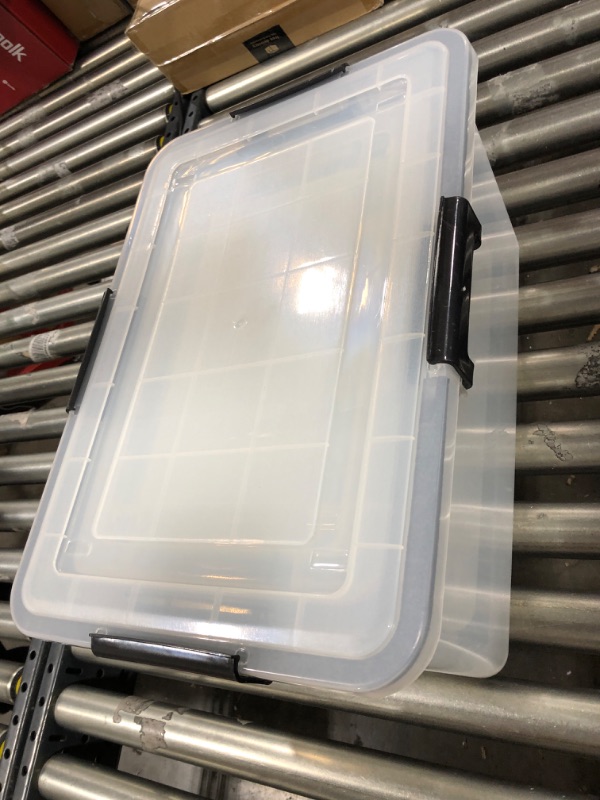 Photo 1 of Varied sized plastic storage bins 3pk