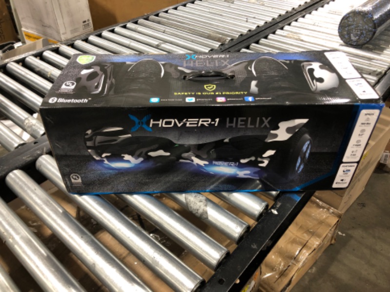 Photo 2 of Hover-1 Helix Electric Hoverboard | 7MPH Top Speed, 4 Mile Range, 6HR Full-Charge, Built-in Bluetooth Speaker, Rider Modes: Beginner to Expert Hoverboard Camo