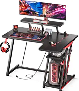 Photo 1 of MOTPK Gaming Desk L Shaped, Small Corner Desk with Storage Shelf & Power Outlets, Computer Desk with Monitor Shelf, L Shaped Desk with Carbon Fiber Surface, Gamer Desk Gaming Table, Black, 39 Inch
