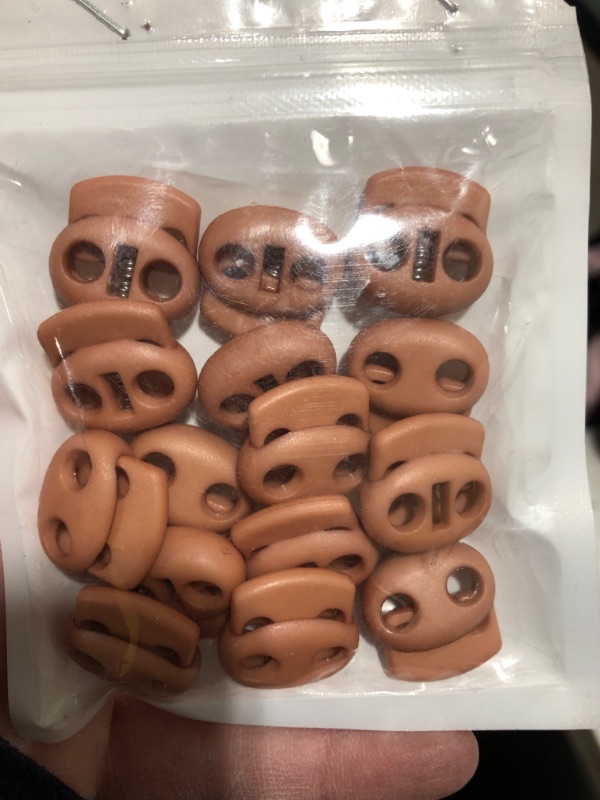 Photo 1 of 3 packs of Odinest Spring Elastic Fastener Toggles 20mm Plastic Cord Lock Buttons Stopper Slider Thread Smooth No Stuck Easy to Position Hold Tightly for DIY Drawstring Shoes Bag Double Hole Brown 15pcs
