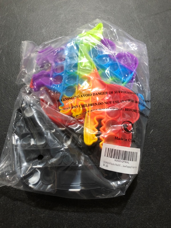 Photo 2 of 4 Packs Pop Poop Toy, Dinosaur Gamepad Controller Sensory Anxiety Stress Relief Cheap Bubble Popper Po Set, Rainbow Poppop https://a.co/d/4EG6God