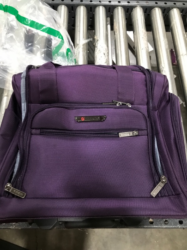 Photo 1 of  travelpro carry on- pull with wheels- PURPLE