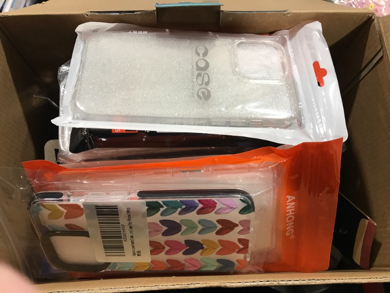 Photo 1 of Cell phone case box lot. Also includes a few smart watch bands and various other accessories. Sold as is.