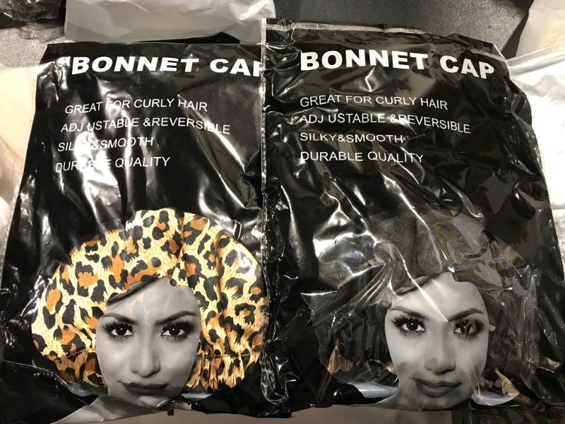 Photo 1 of 2 pack of bonnet caps- animal print and black