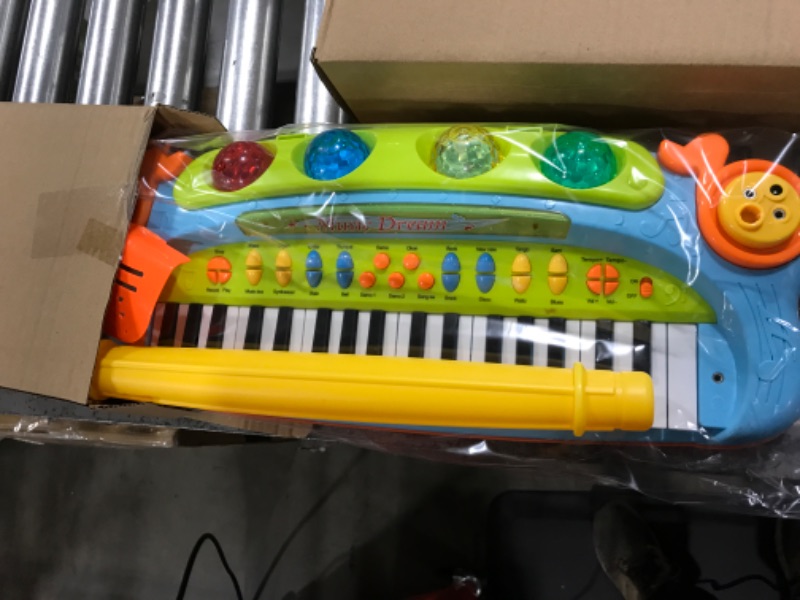 Photo 2 of Electronic 37-Key Toy Piano Keyboard for Kids with Real Working Microphone, Colorful Lights and Stool