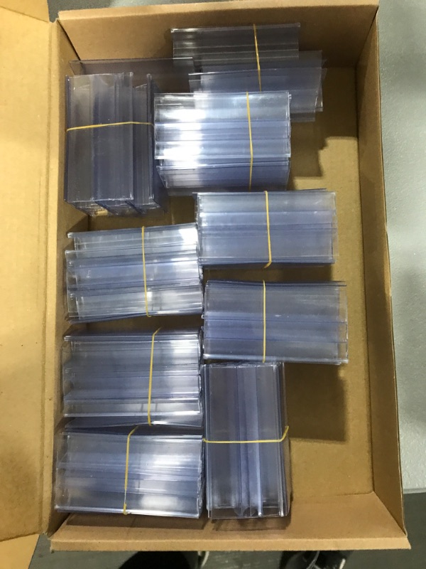 Photo 1 of 70 Pcs Plastic Shelf Label Holder Plastic Price Tag Holder Supermarket Retail Sign Clear Shelf Label Holder Clip on Tag Ticket Holders for Supermarket 3.15 x 1.57 Inch (Middle Clip on)