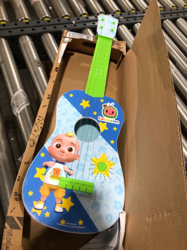 Photo 2 of CoComelon Musical Guitar by First Act, 23.5” Kids Guitar - Plays Clips of The ‘Finger Family’ Song - Musical Instruments for Kids, Toddlers, and Preschoolers
