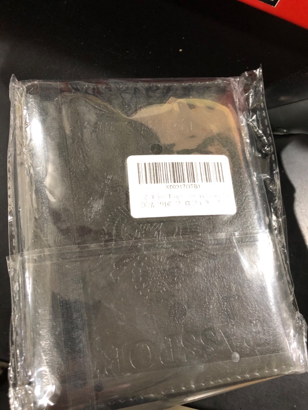 Photo 1 of 2 black passport cases