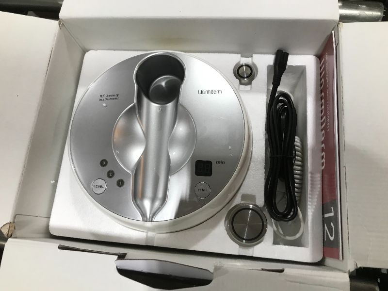 Photo 2 of WarmDerm Professional Home Grooming Device for Face and Body, 3 Energy Levels - Salon Effect
