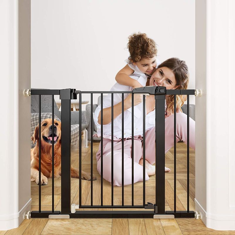 Photo 1 of  OTTOLIVES Metal Baby Gate Pet Gate 27-40 Inch Extra Wide Pressure Mounted Dog Gate for Stairs & Doorways Baby Gate with Door Walk Through Easy Step NO Need Tools NO Drilling, Adjust Size (Metal Black) 