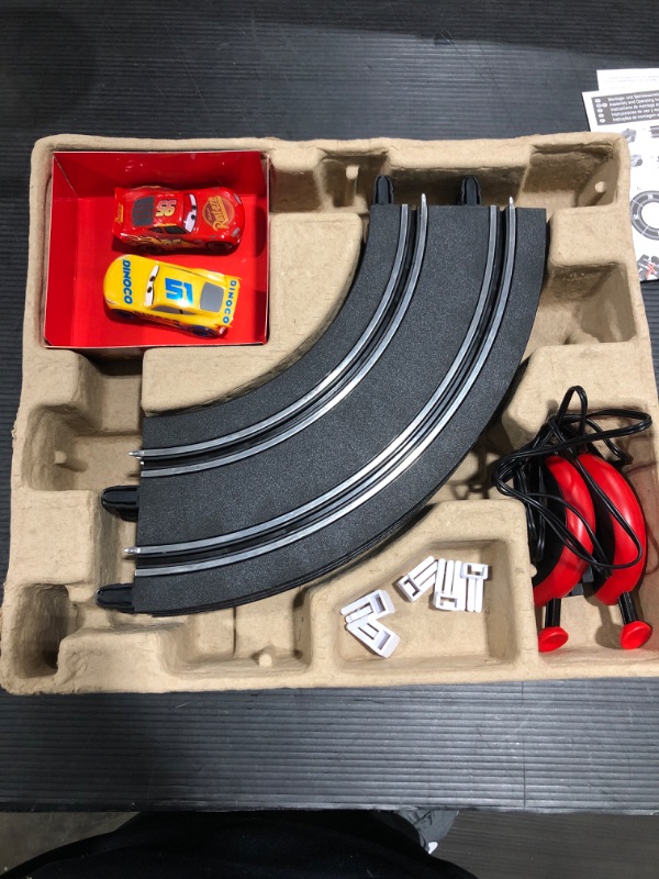 Photo 3 of First Cars 3 - Slot Car Race Track - Includes 2 Cars: Lightning McQueen and Dinoco Cruz - Battery-Powered Beginner Racing Set for Kids Ages 3 Years and Up Disney Pixar Cars 3