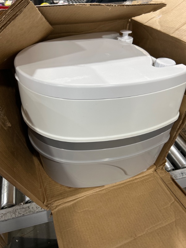 Photo 1 of Camco 41544 Premium Travel Toilet with Detachable Tank | Features a 5.3-Gallon Capacity | Designed for Camping, Hiking, Boating, RVing and More Frustration Free Packaging
