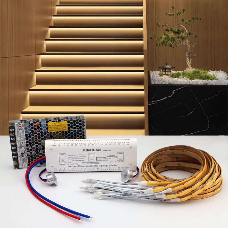 Photo 1 of KOMIGAN Intelligent Motion Sensor LED Stair Lighting Kit KMG-3233, 60 Inch (150 cm) Long Cuttable LED Strip Light for Indoor LED Stair Lights LED Step Lights (18 Stairs, Warm White 3000K)
