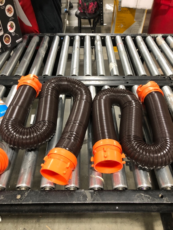 Photo 3 of Camco 20' (39742) RhinoFLEX 20-Foot RV Sewer Hose Kit, Swivel Transparent Elbow with 4-in-1 Dump Station Fitting-Storage Caps Included , Black , Brown 20ft Sewer Hose Kit Frustration-Free Packaging