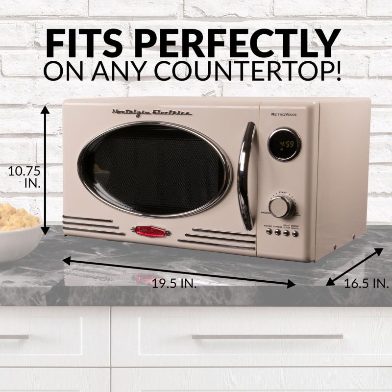 Photo 1 of Nostalgia Retro 0.9 Cu. Ft. 800-Watt Countertop Microwave Oven - Ivory
