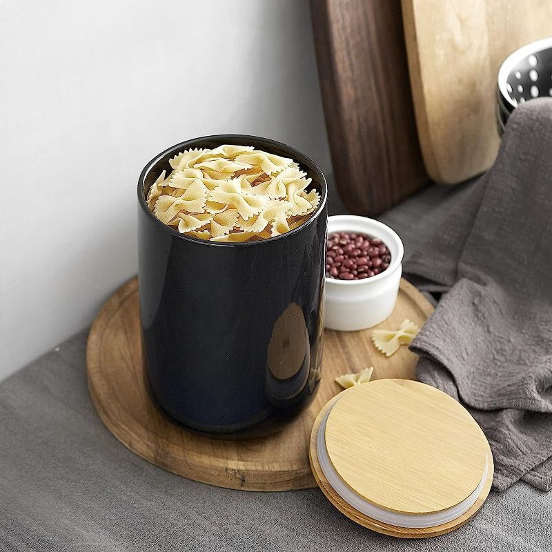 Photo 1 of ZONESUM Coffee Canisters Porcelain Kitchen Canisters, 45 FL OZ Ceramic Food Storage Jar with Wooden Lid Serving Coffee, Cocoa, Cookie, Suger, Kitchen Utensil Holder,  Black
