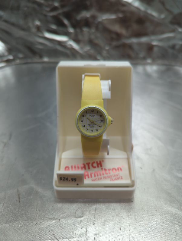 Photo 1 of Awatch by Armitron - Water Resistant Quartz - Watch w/Yellow Band