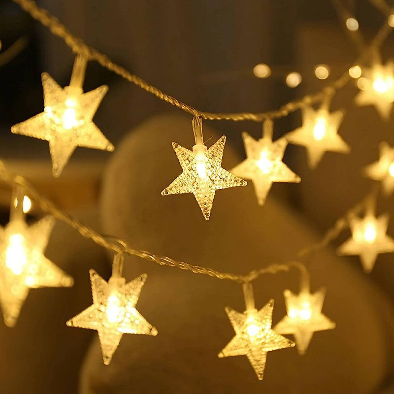 Photo 1 of Star String Lights, 20 FT 40 LED Twinkle Lights Warm White Battery Operated Cute Hanging Star Fairy Light for Bedroom Room Car Camper Party Home Indoor Outdoor Xmas Decor Christmas Tree Decorations
