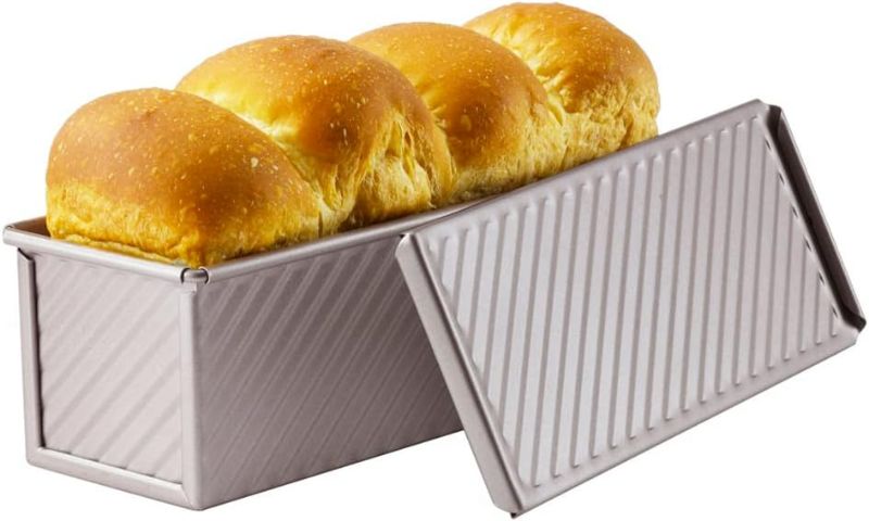 Photo 1 of CHEFMADE Mini Pullman Loaf Pan with Lid, 0.66Lb Dough Capacity Non-Stick Rectangle Corrugated Toast Box for Oven Baking 2.8" x 8.1"x 2.8"(Champagne Gold)
