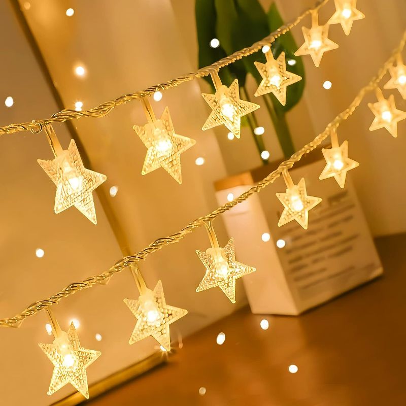 Photo 1 of Star String Lights, 20 FT 40 LED Twinkle Lights Warm White Battery Operated Cute Hanging Star Fairy Light for Bedroom Room Car Camper Party Home Indoor Outdoor Xmas Decor Christmas Tree Decorations
