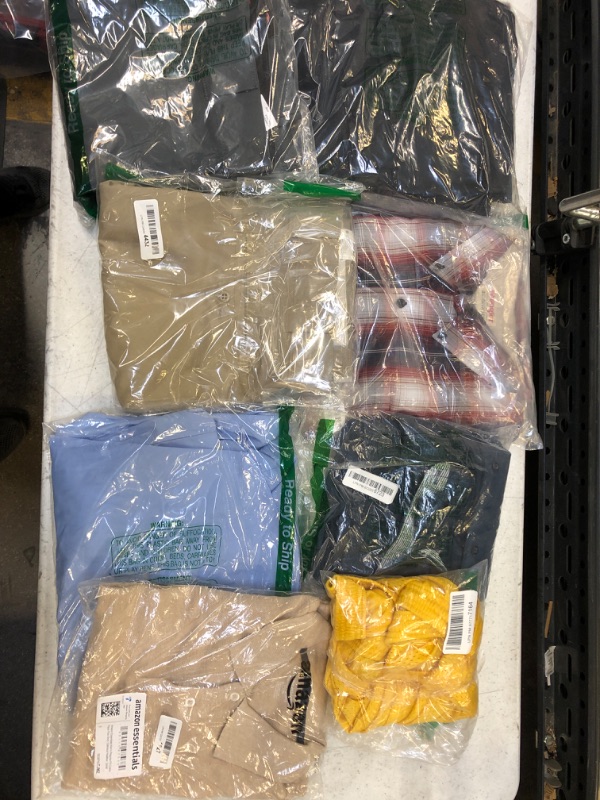 Photo 1 of MISC LOT OF MENS CLOTHES , USED AND NEW 