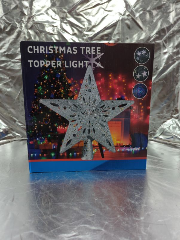 Photo 4 of Christmas Tree Topper Lighted Star [Silver],3D Hollow Sparkling Star Christmas Tree Topper with Rotating Magic Cool White Snowflake Projector for Christmas Tree Ornament (Silver)
