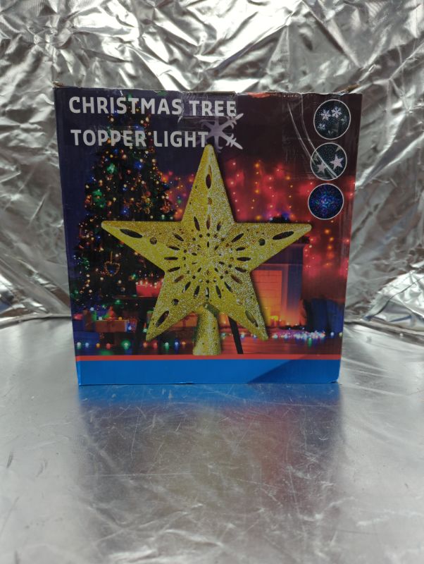 Photo 4 of Christmas Tree Topper Lighted Star [Gold],3D Hollow Sparkling Star Christmas Tree Topper with Rotating Magic Cool White Snowflake Projector for Christmas Tree Ornament (Gold)
