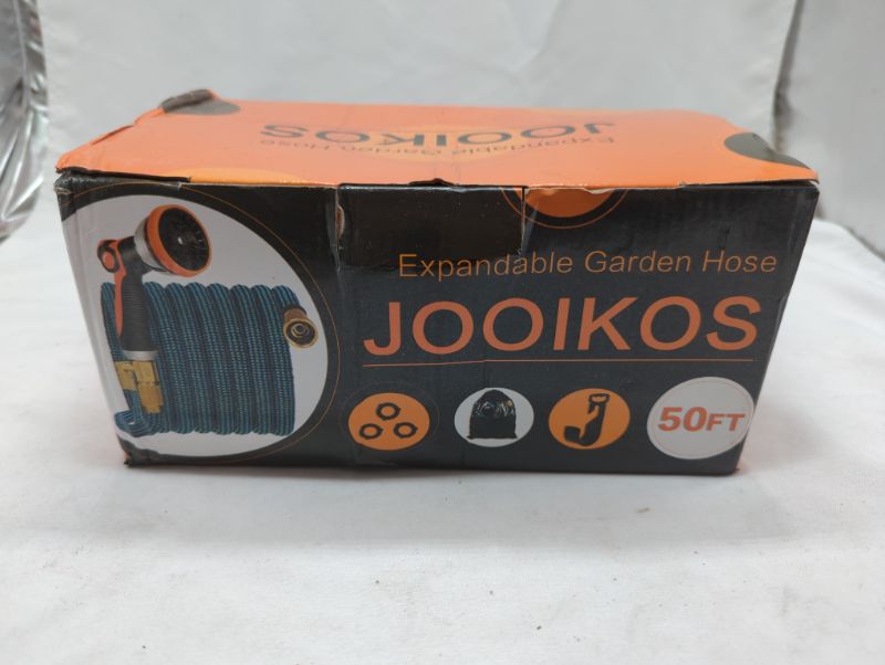 Photo 2 of JOOIKOS Expandable Garden Hose 50ft - Water Hose with 10 Functions Nozzle and Durable 3/4" Solid Brass Connectors