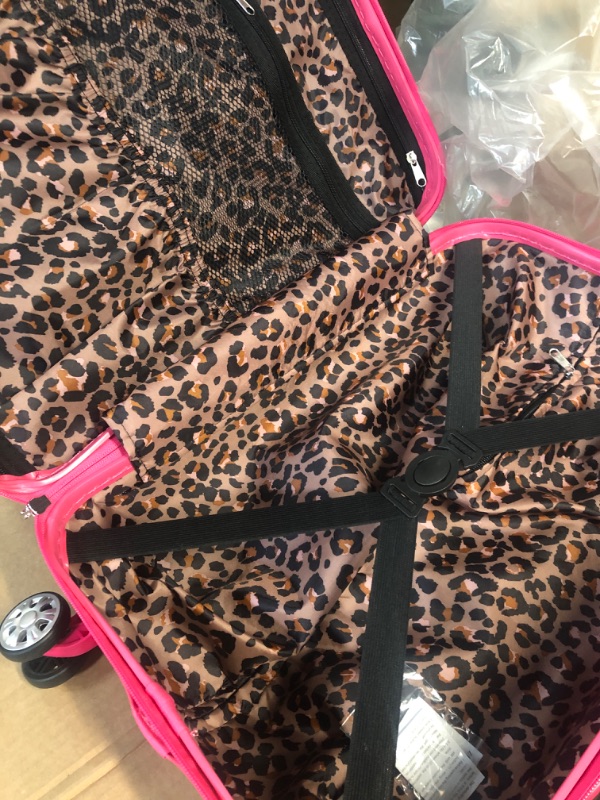 Photo 2 of * item has large dent * see images *
Rockland Safari Hardside Spinner Wheel Luggage, Magenta Leopard, Carry-On 20-Inch Carry-On 20-Inch Magenta Leopard