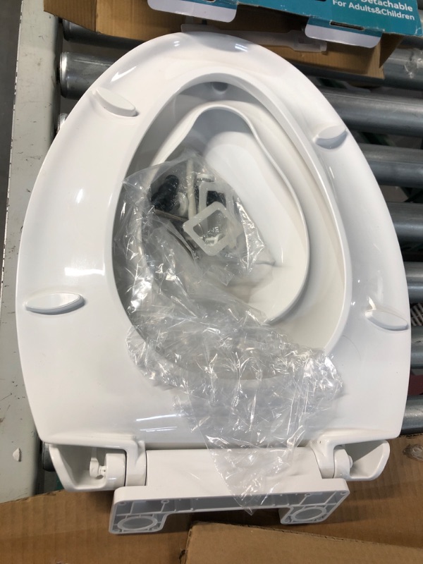 Photo 1 of **USED** Toilet Seat with Toddler Seat Built in, Potty Training Toilet Seat for Kids, Magnetic Kids Toilet Seat, Slow Close, (18.5”Elongated) White Elongated