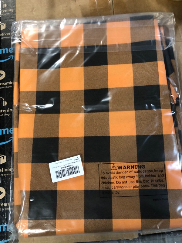 Photo 1 of *DIMENSIONS UNKNOWN* Hiasan Waterproof Round Tablecloth, Orange & Black