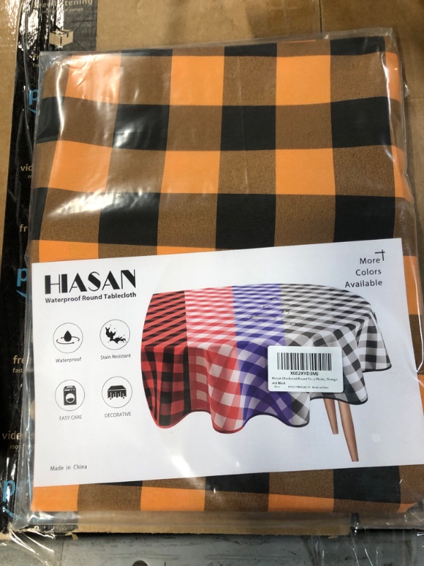 Photo 1 of *DIMENSIONS UNKNOWN* Hiasan Waterproof Round Tablecloth, Orange & Black