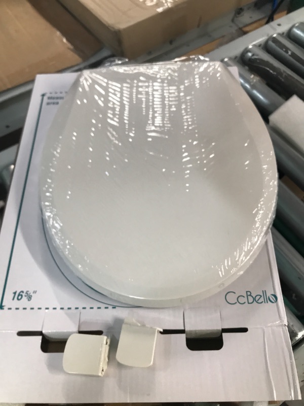 Photo 1 of *DAMAGED* Toilet Seat With Toddler Seat Built in, (16.5”) Biscuit/Linen Round