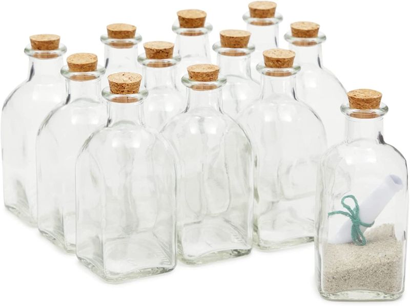 Photo 1 of (REFERENCE STOCK PHOTO) 24Pack Clear Glass Bottles 5"x3" (no cork lids)