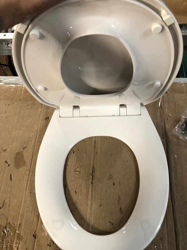 Photo 3 of [Factory Sealed] Round Toilet Seat with Built in Potty Training Seat, Slow Close, Easy Clean, Plastic, White