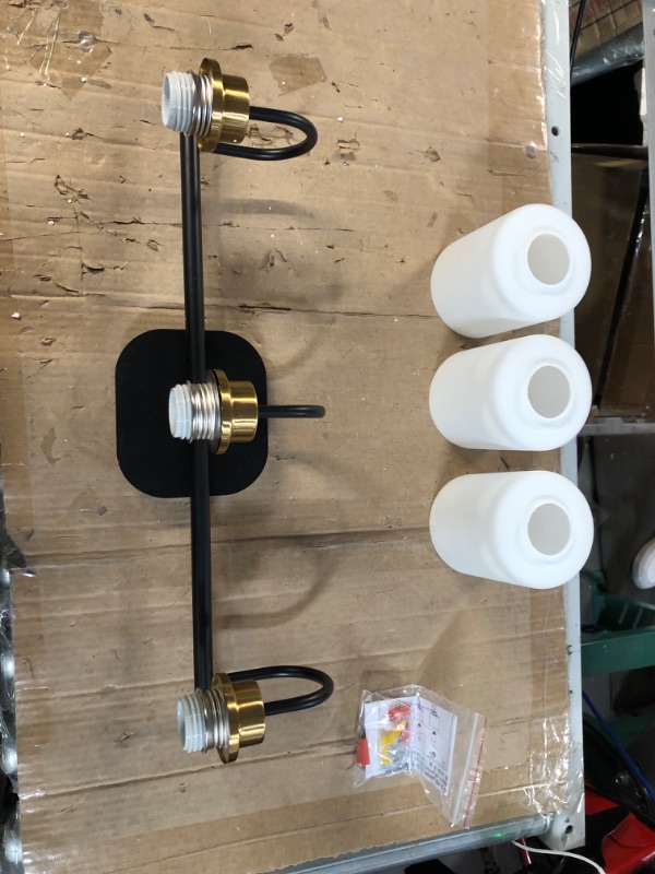 Photo 2 of [Like new] ZHUOER Mid Century Modern Matte Black and Gold Bathroom Vanity Light Fixtures 3 Lights Milky Glass (No Bulb)