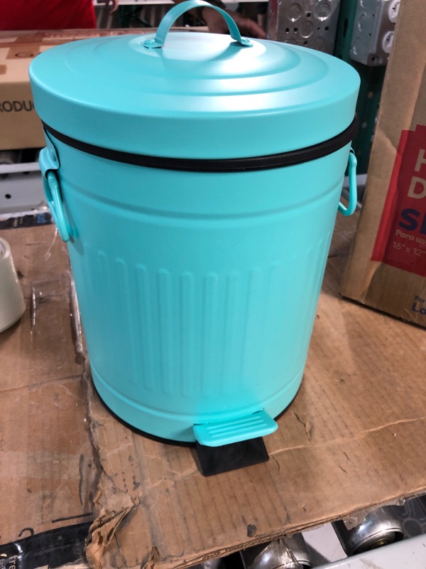 Photo 1 of Teal trash can 