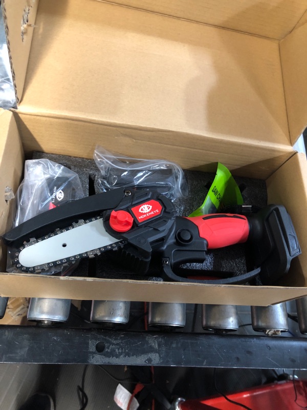 Photo 2 of *SEE NOTES 4 inch Cordless Mini Chainsaw with 1 Rechargeable Battery, Small Portable Handheld Power Chain saw with Safety Lock