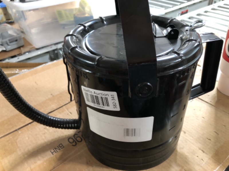 Photo 3 of LUMAX LX-1536 Black 5 Quart Flow Control Measure Can with Flex Spout. Self-Locking lid for dust Free Operation. Thumb Operated Valve Controls Flow – Flip-Action Locks Valve Open.