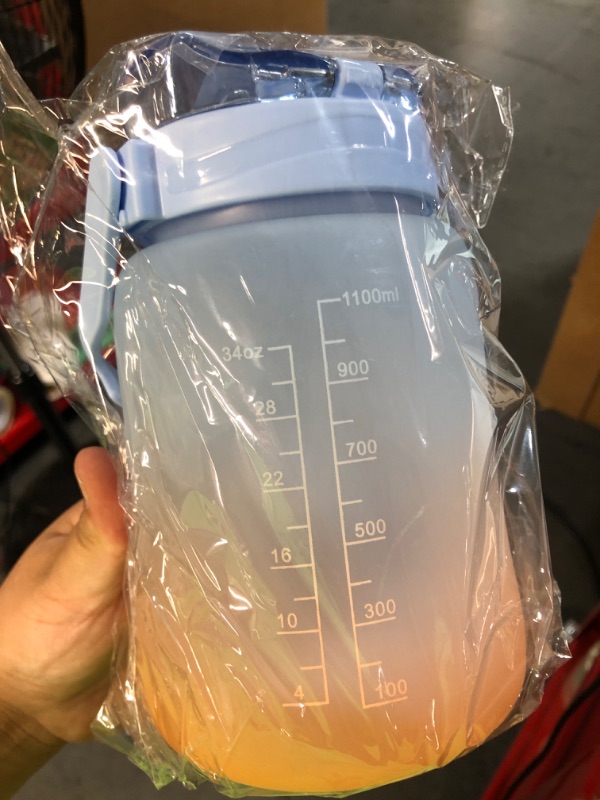 Photo 1 of  Water Bottle with Straw 40oz Green Water Jug