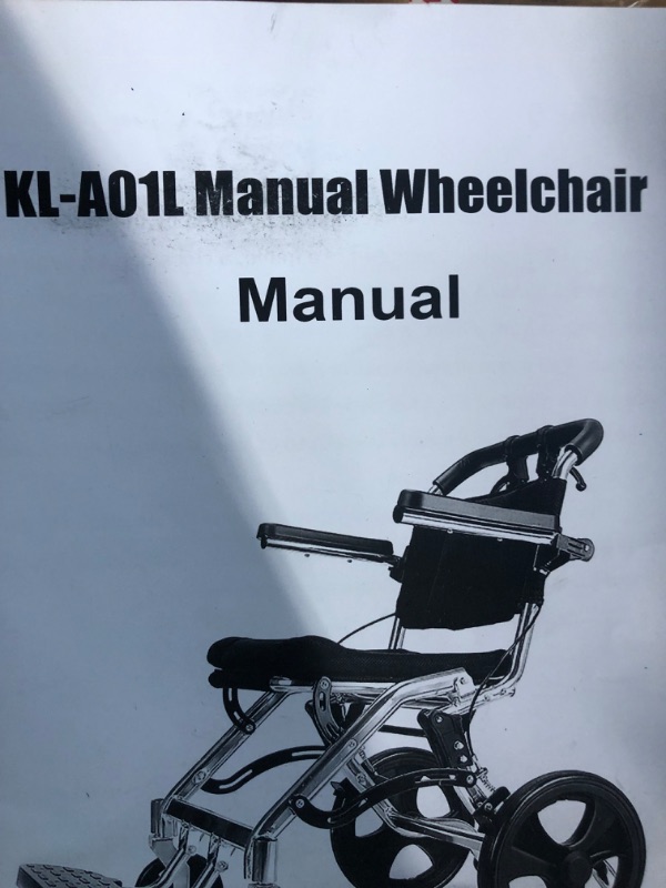 Photo 2 of **USED BUT APPEARS NEW** Folding Wheelchair