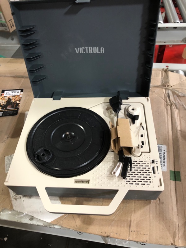 Photo 2 of Victrola Re-Spin Sustainable Suitcase Vinyl Record Player, 3-Speed (33 1/3, 45 & 78 RPM), Belt-Driven Bluetooth Turn Table with Built-in Bass Radiator, 3.5mm Headphone Jack, Gray Gray Re-Spin