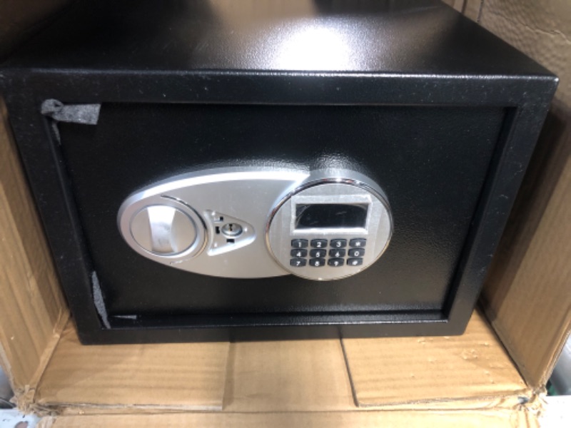 Photo 2 of * used *
Amazon Basics Steel Security Safe and Lock Box with Electronic Keypad - Secure Cash, Jewelry, ID Documents 